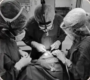 A surgical team operating on a patient